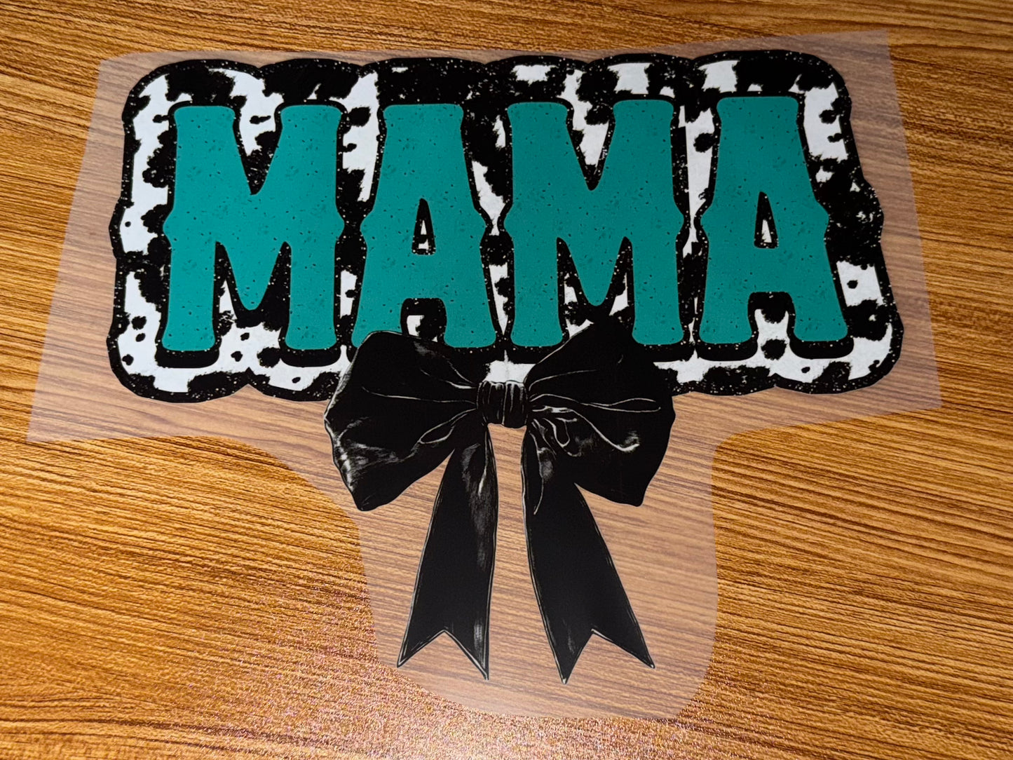 TEAL MAMA COW PRINT WITH BLACK BOW