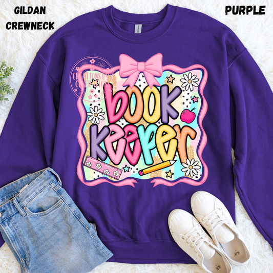 BOOK KEEPER WITH BOW AROUND IT SWEATSHIRT PREORDER